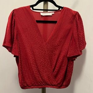 ASTR red blouse